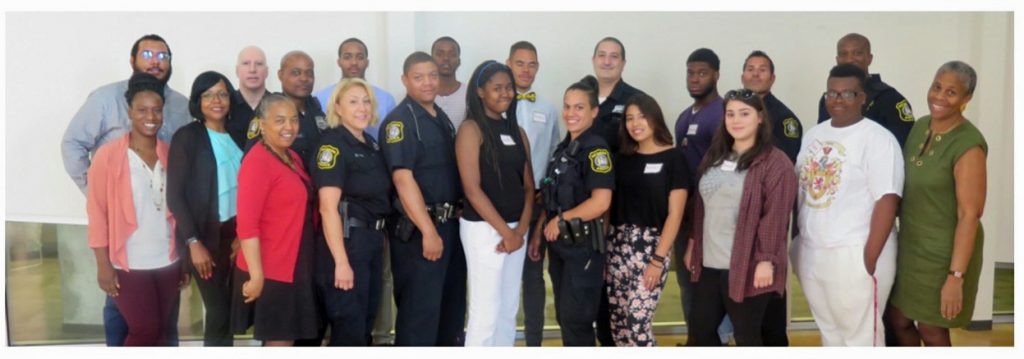 Lenora Fulani Gloria Strickland and Will Simpson with police and youth