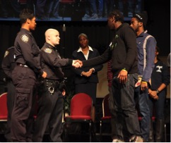 Lenora Fulani leading a Cops and Kids Demonstration Workshop